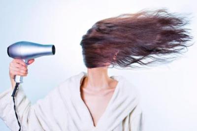 blow drying hair - straighten natural hair - Tony Crystal Labs
